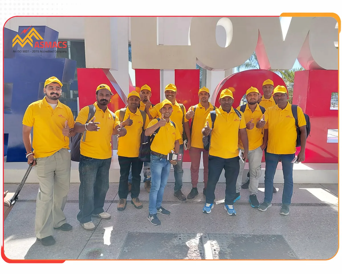 ASMACS team of skilled Indian workers in branded uniforms after arriving in Nice, France for the Ajaccio Corsica international project